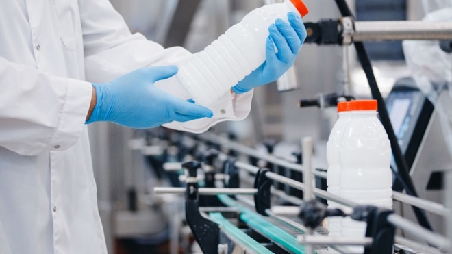 Controllo produzione bottiglie latte