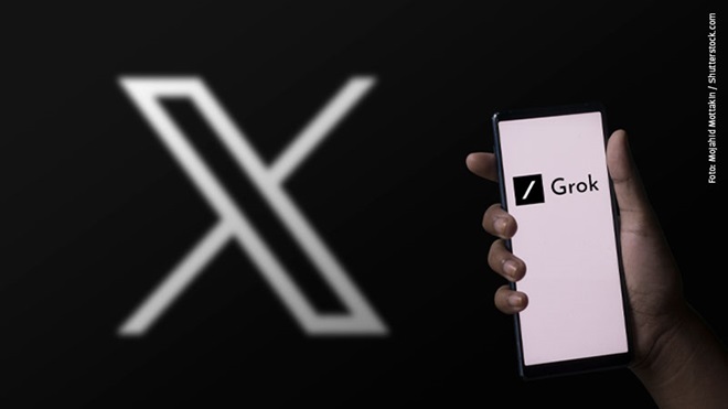 logo x su sfondo nero e mano telefono